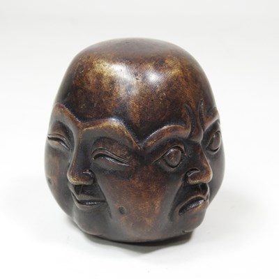 Lot 241 - A bronze Buddha head, 7cm high