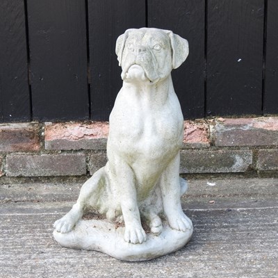 Lot 557 - A garden stone garden statue of a seated dog,...