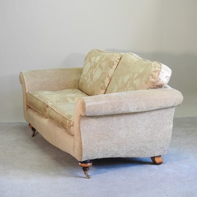 Lot 466 - A gold upholstered two seater sofa, with...