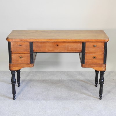 Lot 411 - An early 20th century French kneehole desk