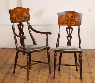 Lot 631 - A pair of Art Nouveau inlaid mahogany chairs,...