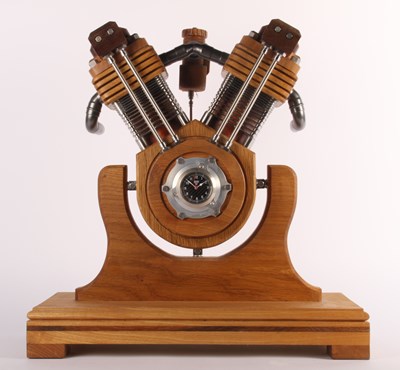 Lot 254 - A large 20th century oak mantel clock in the...