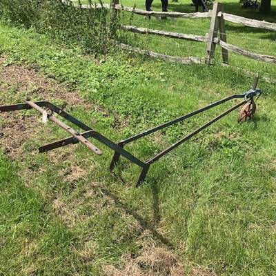 Lot 539 - An early 20th century horse drawn adjustable scoop hoe