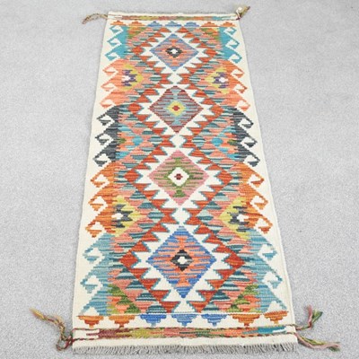 Lot 541 - A chobi kilim runner, with all over coloured...