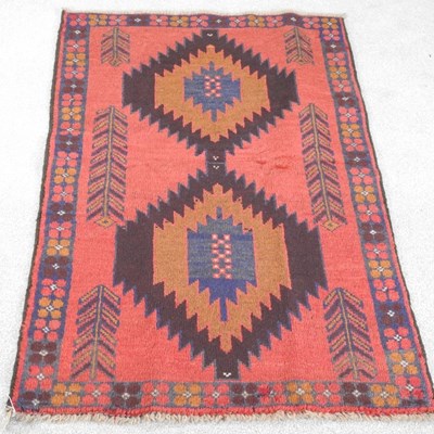 Lot 288 - A Baluchi rug, with two central medallions and...
