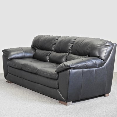Lot 627 - A modern black leather upholstered sofa