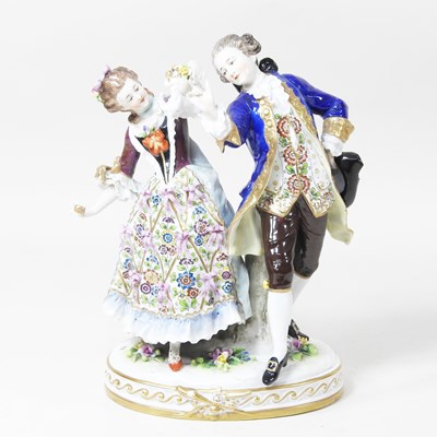Lot 100 - A Naples porcelain figure group, of an 18th...