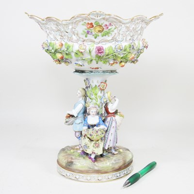 Lot 148 - A Meissen style porcelain figural basket,...