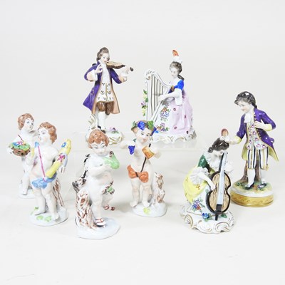 Lot 197 - A set of four Naples porcelain cherubs,...