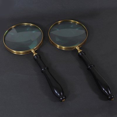 Lot 411 - A pair of large modern magnifying glasses,...