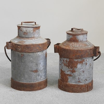 Lot 284 - A metal milk churn, 58cm high, together with...