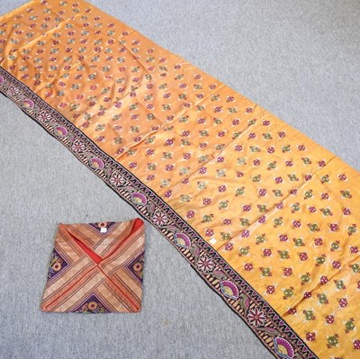 Lot 180 - An Eastern yellow silk panel