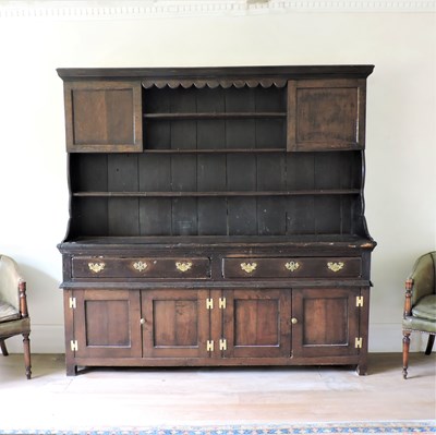 Lot 3 - A large dark oak Welsh dresser