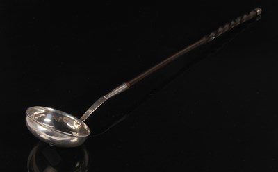 Lot 125 - A Georgian Scottish silver toddy ladle, with...