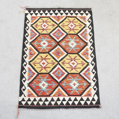 Lot 187 - A Persian kilim rug, with hexagonal designs,...