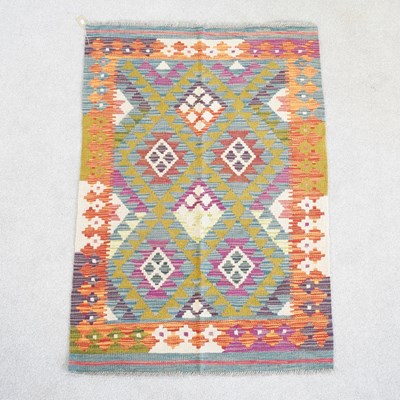 Lot 404 - A kilim rug, with coloured designs, 145 x 100cm