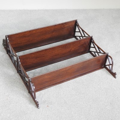 Lot 519 - A 19th century mahogany three tier wall shelf,...