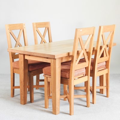 Lot 285 - A modern light oak dining table, together with...