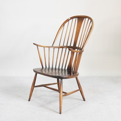 Lot 452 - An Ercol windsor armchair, model 911, on...