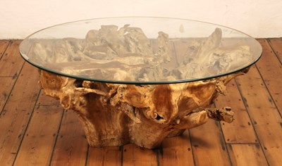 Lot 298 - An Indonesian teak rootwood coffee table, with...