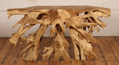 Lot 232 - An Indonesian teak rootwood console table