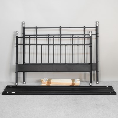Lot 469 - A modern metal double bedstead, with a slatted...