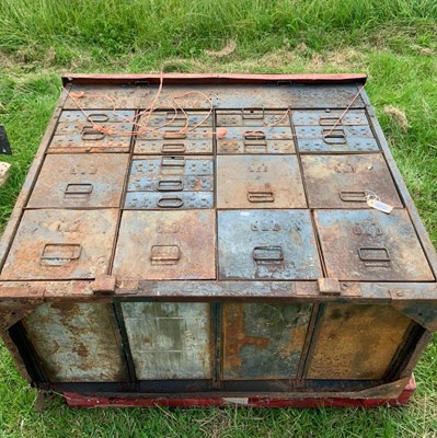 Lot 389 - Amended - A metal bank of drawers