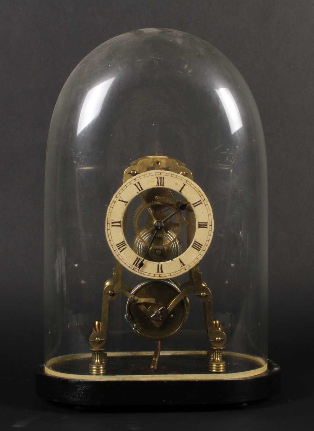 Lot 42 - A brass skeleton clock, late 19th/early 20th...