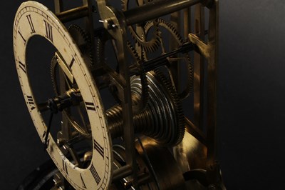 Lot 42 - A brass skeleton clock, late 19th/early 20th...