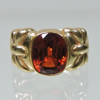 Lot 50 - A 14 carat gold hessonite garnet ring