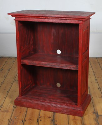 Lot 519 - An Eastern red painted hardwood bookcase, on a...
