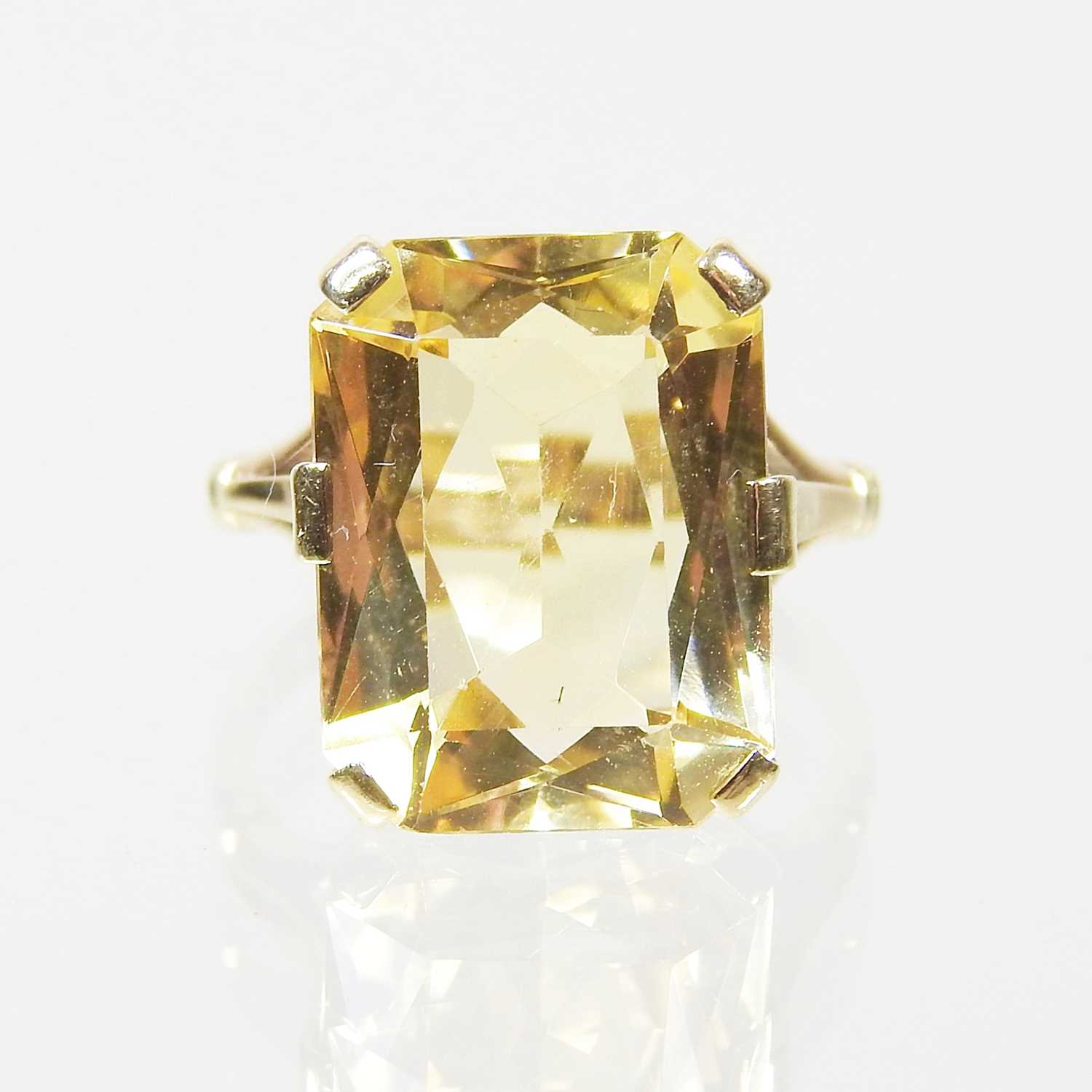 Lot 28 - A large 9 carat topaz cushion cut dress ring,...