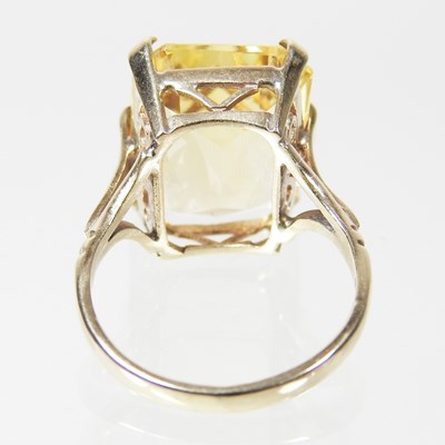 Lot 28 - A large 9 carat topaz cushion cut dress ring,...