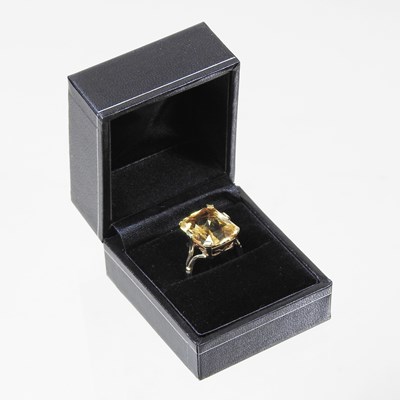 Lot 28 - A large 9 carat topaz cushion cut dress ring,...