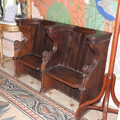 Lot 30 - A 19th century carved oak church pew