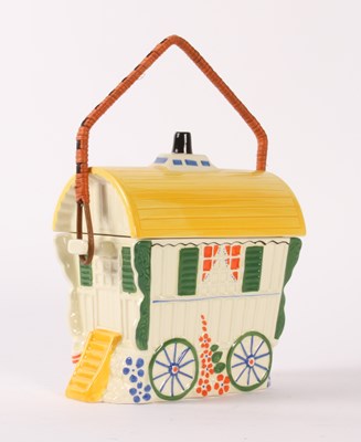 Lot 630 - A pottery biscuit barrel, in the form of a...