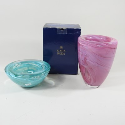 Lot 40 - A Swedish Kosta Boda pink glass vase, with...