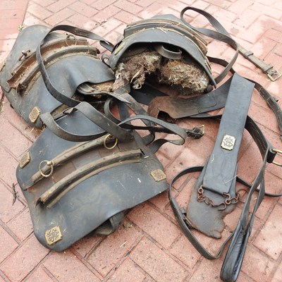 Lot 376 - A set of three horse driving saddle pads