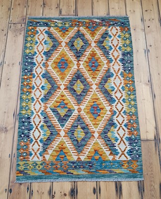 Lot 175 - A Persian kilim, with coloured diamonds, 158 x...