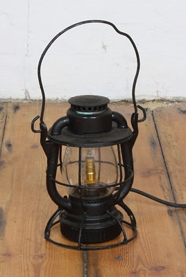 Lot 688 - An early 20th century black painted American...