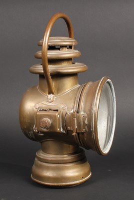 Lot 382 - An early 20th century Dietz brass car lamp,...