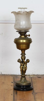 Lot 315 - A large Victorian brass oil lamp, having a...