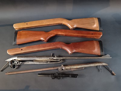 Lot 663 - A collection of air rifle parts, comprising...