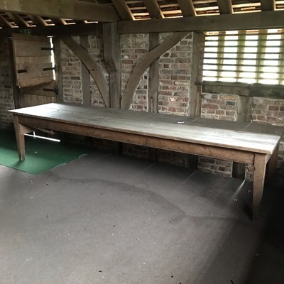 Lot 42 - A large rustic pine kitchen table