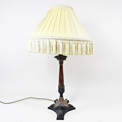 Lot 729 - An ornate painted metal table lamp and shade,...