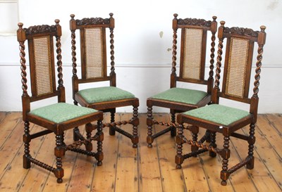 Lot 483 - A set of four 1920s Carolean style oak dining...
