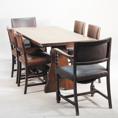 Lot 663 - An old charm style oak dining suite,...