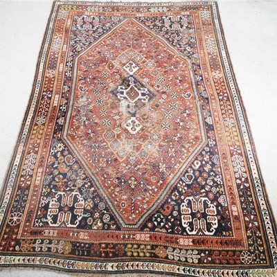 Lot 668 - A Qashqai rug, with a large central medallion,...