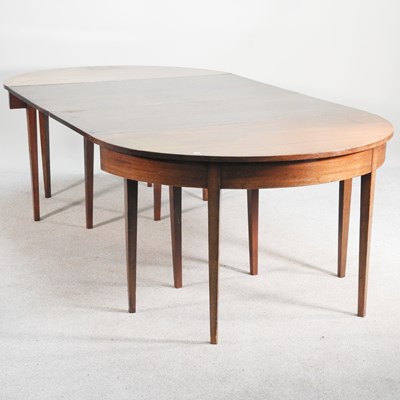 Lot 588 - A George III mahogany D end dining table, with...