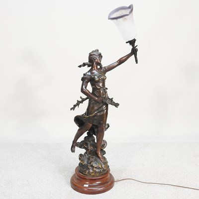 Lot 135 - An Art Nouveau style bronzed figural lamp,...